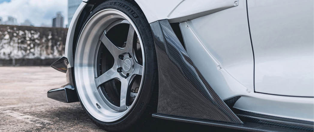 Toyota GR Supra on the Avant Garde SR11 in Gunmetal center with Brushed lip.